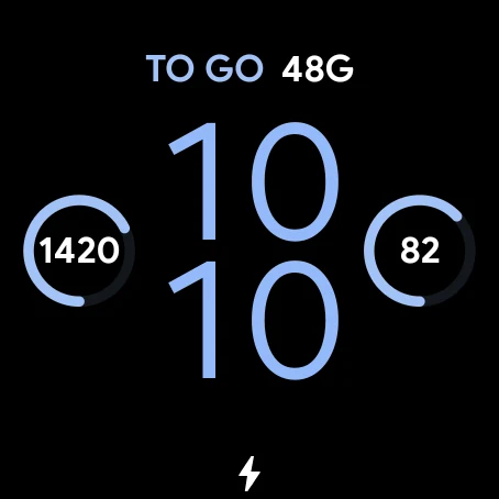 Un cadran Wear OS avec deux anneaux Snapkin à côté de l'heure : 1420 calories à gauche, 82 grammes de protéines à droite, et encore 48 g en haut.