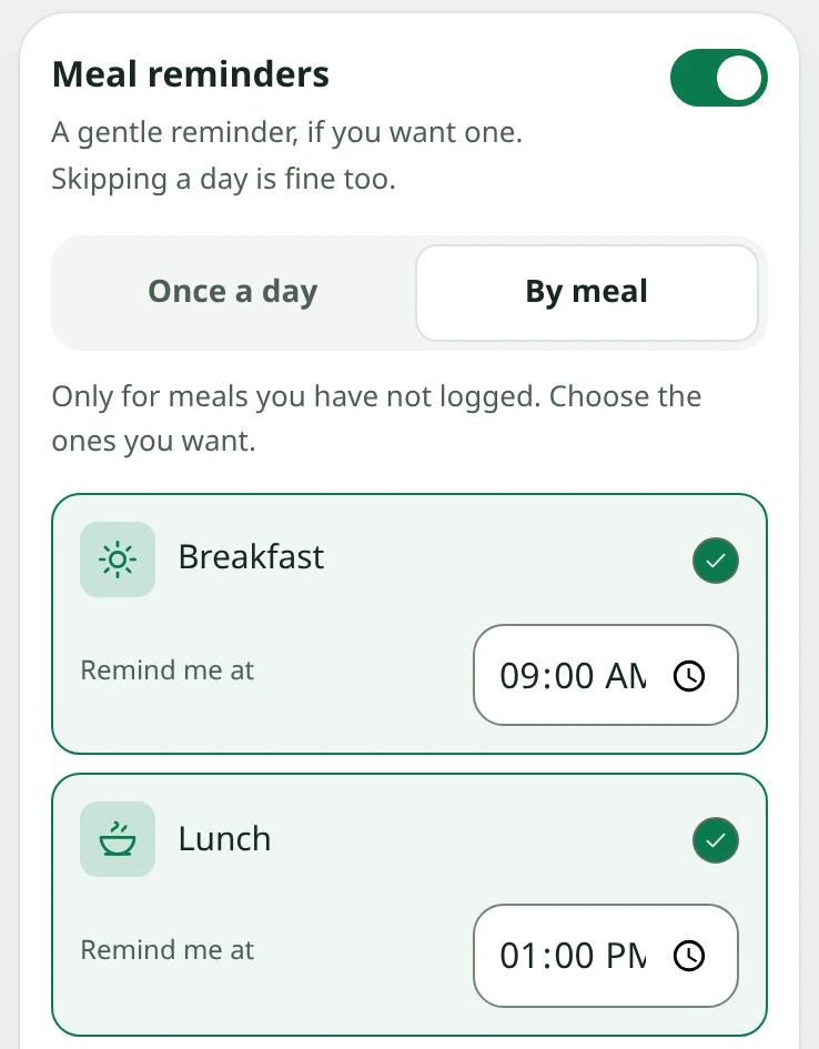 Snapkin reminder settings by meal: a breakfast reminder at 9:00 AM and a lunch reminder at 1:00 PM, each with its own time.