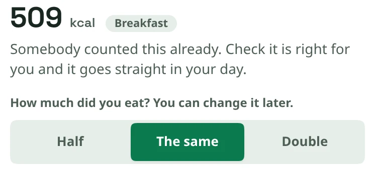 Snapkin app screen for a meal a friend shared: 509 kcal for breakfast, a note that somebody already counted it, and a choice of Half, The same or Double portion.